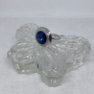 Sarah Covenry silver tone faux sapphire costume ring.